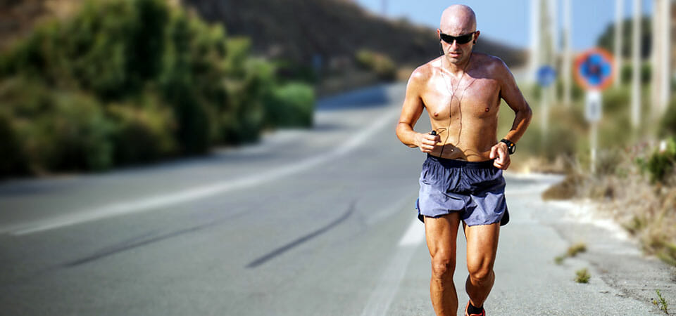 man running with earbuds