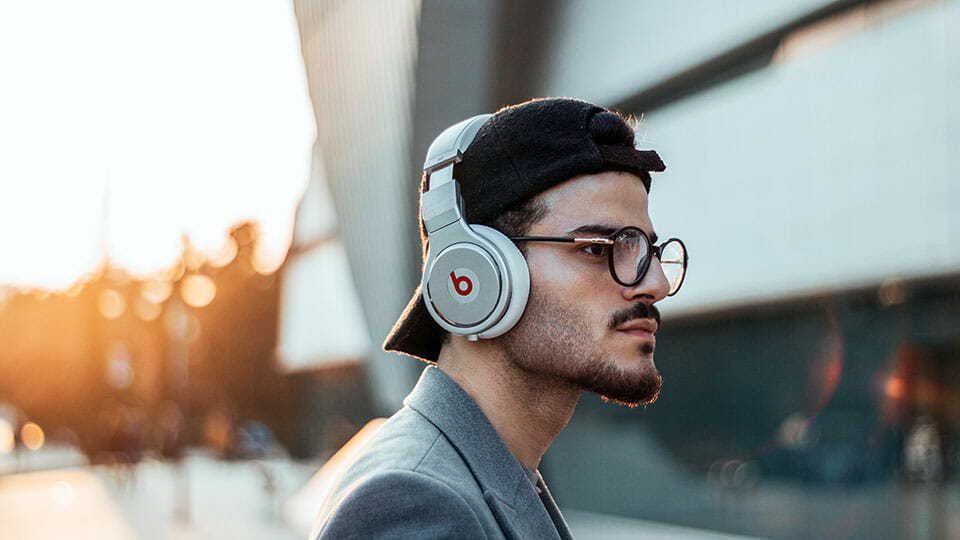 Person listening to Beats headphones